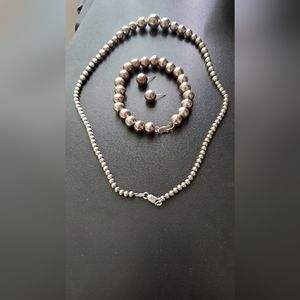 Set of necklace, bracelet and earrings - silver color